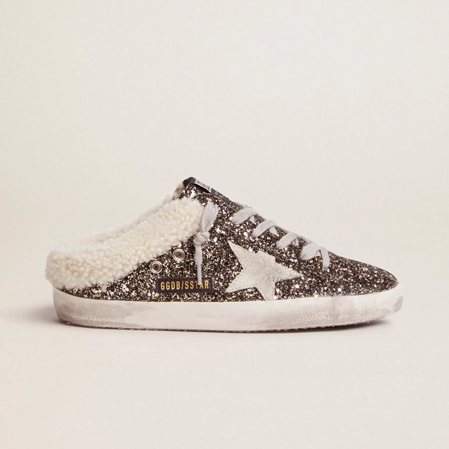 GOLDEN GOOSE SUPER STAR SABOT SNEAKERS IN BLACK & GOLD WITH SHEARLING LINING