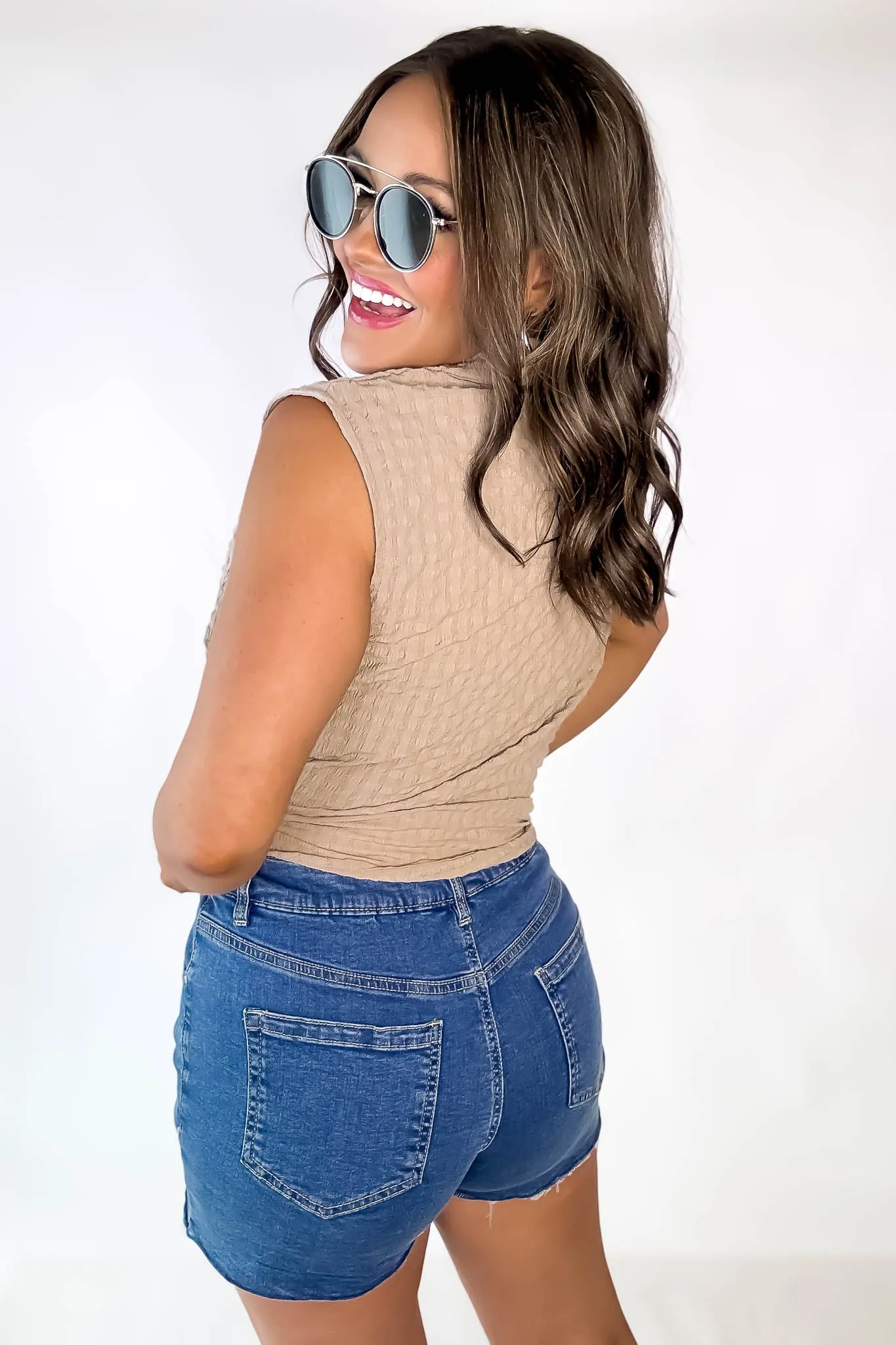 High Rise Medium Wash Frey Hem Denim Shorts
