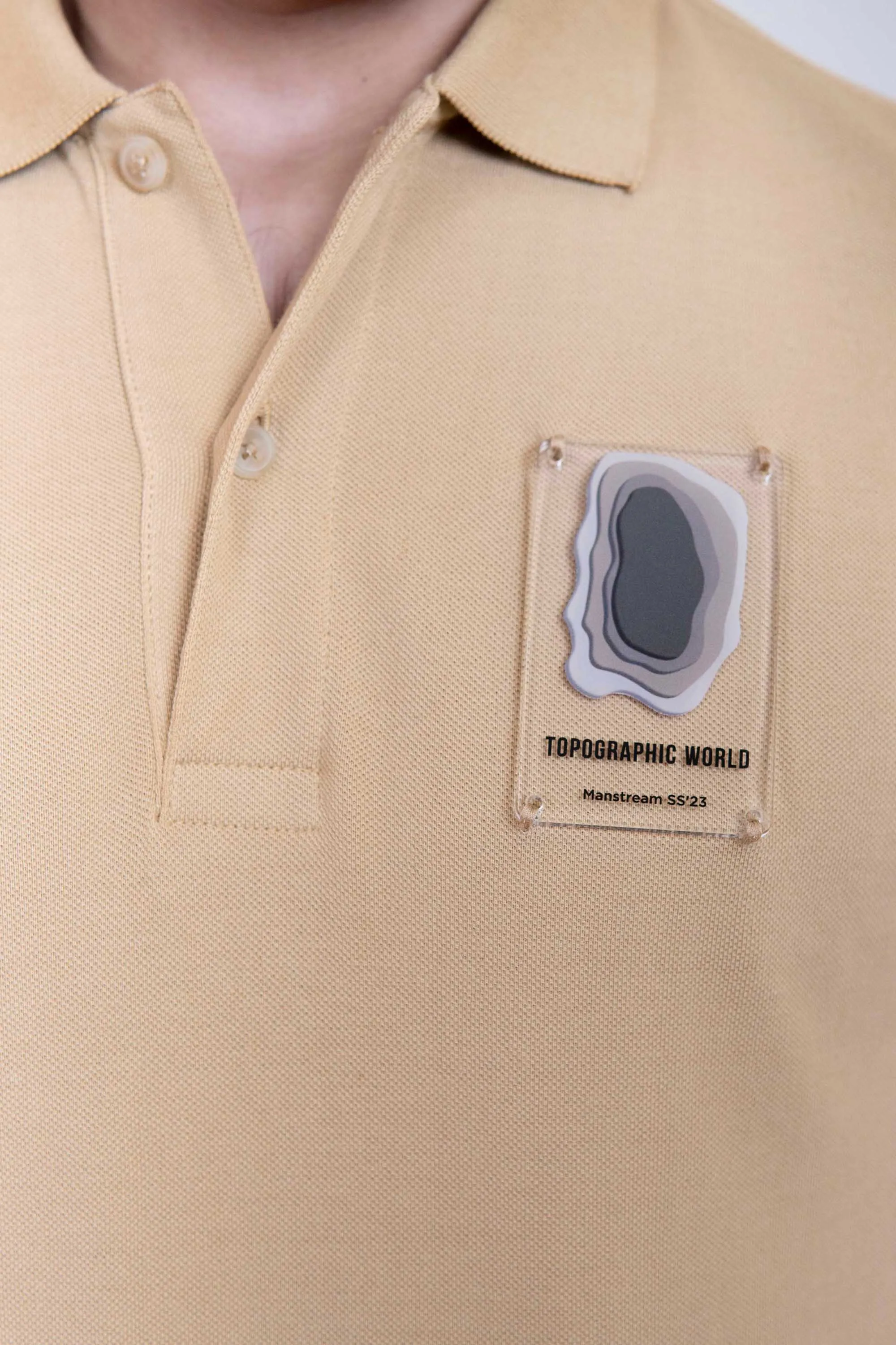 Sand Acrylic Badge Polo Shirt
