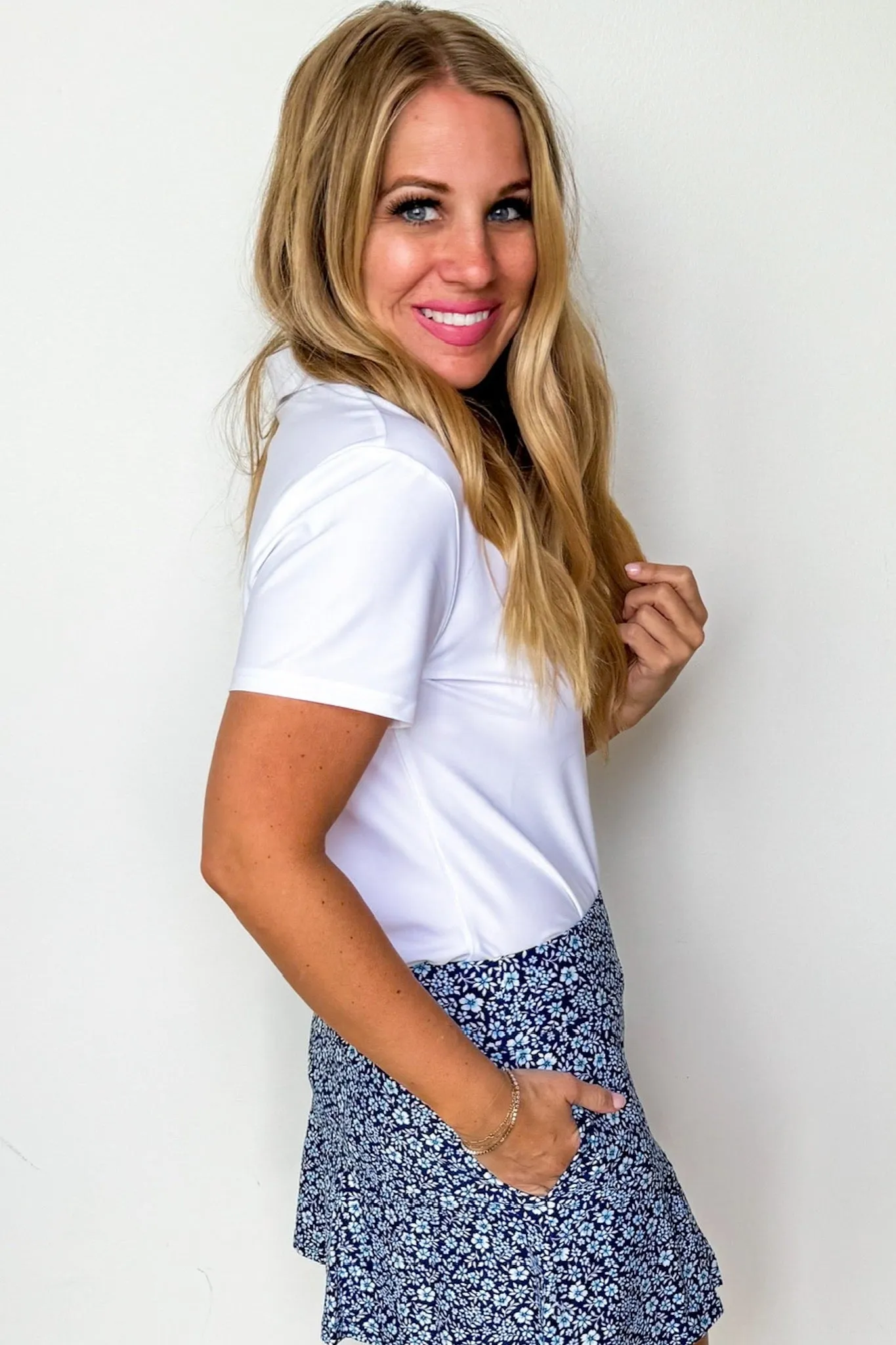 The Kenia Gold Button Up Short Sleeve Polo Top in White
